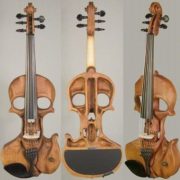 Skull carved violins