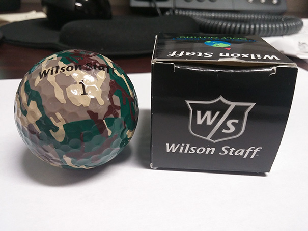Camouflage golf balls